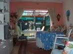 lounge - Inside
                area for relaxation. Here you can watch tv, listen to
                the radio or enjoy reading a book. Breakfast can be
                served here too.